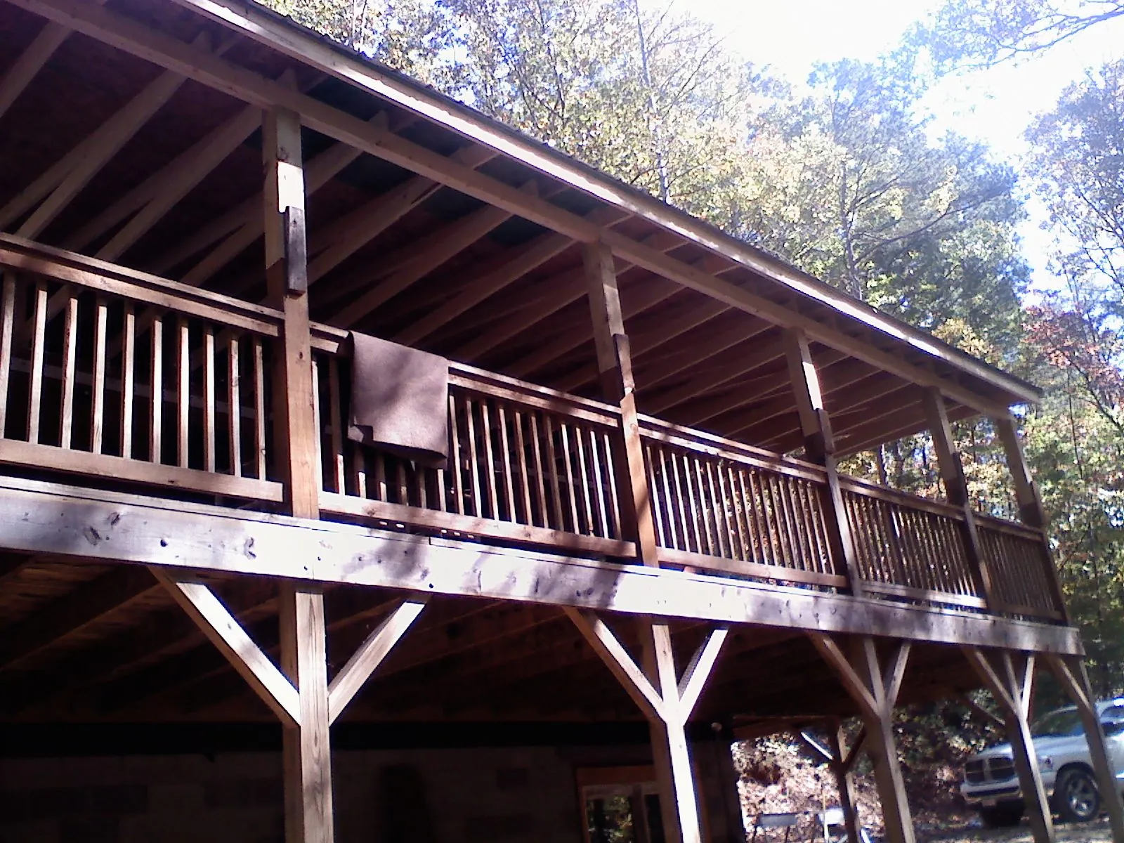 Timber framing under a new elevated porch and deck — Roof Leak Repair in Waterman by Roofing Brothers